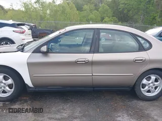 2003 Ford Taurus SE Standard with VIN 1FAFP53U63G125751, listed as a IAAI auction lot 41933803 with 196,710 mi miles. Bid and sale history available at carsss.com. Image 15.