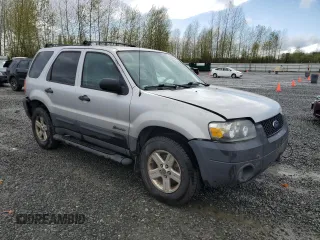 2005 Ford Escape Hybrid z VIN 1FMCU95H75KC07240, wystawiony jako Copart lot #52515925 z przebiegiem 217 237 mil mil oraz Szkoda całkowita • Salvage title. Historia ofert i sprzedaży dostępna na DreamBid. Obrazek 4.