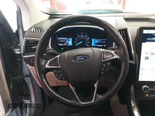2021 Ford Edge Titanium with VIN 2FMPK4K95MBA50355, listed as a IAAI auction lot 42821253 with 109,191 mi miles and . Bid and sale history available at DreamBid. Image 34.