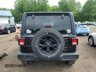 2022 Jeep Wrangler Unlimited Willys with VIN 1C4HJXDN4NW130060, listed as a Copart auction lot 58539485 with 39,930 mi miles and Salvage title. Bid and sale history available at DreamBid. Image 6.