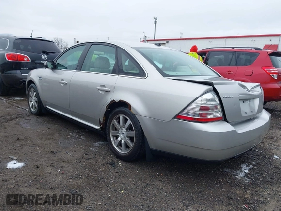 2008 Ford Taurus SEL with VIN 1FAHP24W68G122802, listed as a IAAI auction lot 42020217 with 168,265 mi miles. Bid and sale history available at carsss.com. Image 3.