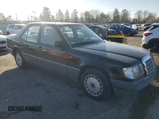 1990 Mercedes-Benz 300 with VIN WDBEB28D9LB211854, listed as a Copart auction lot 49795515 with 241,074 mi miles and Salvage Title. Bid and sale history available at DreamBid. Image 4.