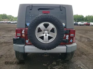 2008 Jeep Wrangler Sahara with VIN 1J4FA54178L566037, listed as a Copart auction lot 61439685 with 115,812 mi miles and Salvage title. Bid and sale history available at DreamBid. Image 6.