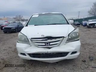 2006 Honda Odyssey EX with VIN 5FNRL384X6B433665, listed as a IAAI auction lot 42027622 with 215,990 mi miles and . Bid and sale history available at DreamBid. Image 11.