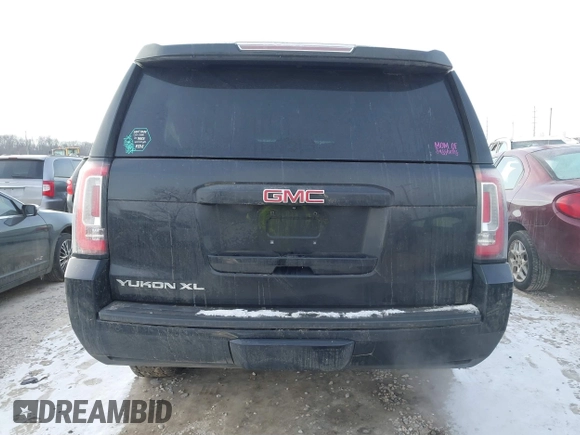 2015 GMC Yukon XL SLT with VIN 1GKS2HKC6FR257133, listed as a IAAI auction lot 41385913 with 150,238 mi miles. Bid and sale history available at carsss.com. Image 16.