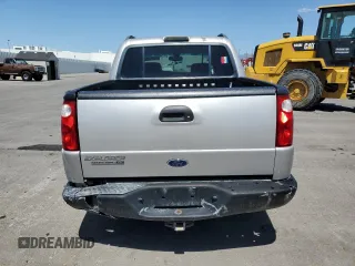 2005 Ford Explorer Sport Trac XLS with VIN 1FMZU77K25UA07118, listed as a Copart auction lot 54267095 with 170,197 mi miles and Salvage title. Bid and sale history available at DreamBid. Image 6.