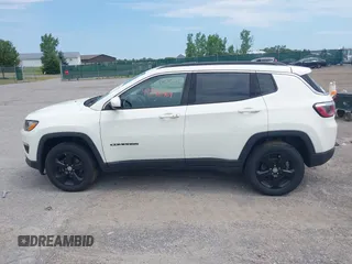 2019 Jeep Compass Latitude with VIN 3C4NJDBB8KT684116, listed as a IAAI auction lot 42596469 with 73,219 mi miles and . Bid and sale history available at DreamBid. Image 14.