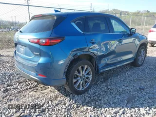 2024 Mazda CX-5 S Premium with VIN JM3KFBDL7R0422133, listed as a IAAI auction lot 42103114 with 37,346 mi miles and . Bid and sale history available at DreamBid. Image 4.