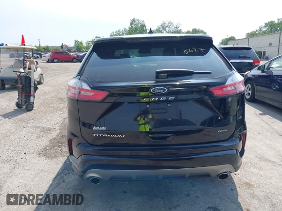 2022 Ford Edge Titanium with VIN 2FMPK4K99NBA12452, listed as a IAAI auction lot 42405627 with 53,015 mi miles and . Bid and sale history available at DreamBid. Image 16.
