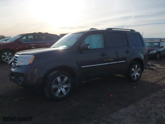 2013 Honda Pilot Touring with VIN 5FNYF4H94DB058177, listed as a IAAI auction lot 41502499 with 157,128 mi miles. Bid and sale history available at carsss.com. Image 2.