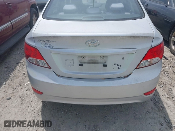 2013 Hyundai Accent GLS with VIN KMHCT4AE3DU403616, listed as a IAAI auction lot 42095208 with 128,523 mi miles. Bid and sale history available at carsss.com. Image 6.