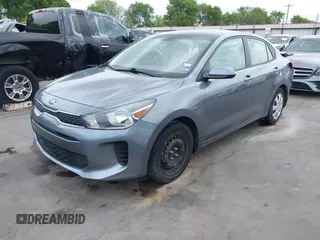 2020 Kia Rio LX with VIN 3KPA24AD9LE332005, listed as a IAAI auction lot 41870210 with 71,777 mi miles and . Bid and sale history available at DreamBid. Image 21.
