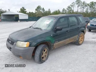 2002 Ford Escape with VIN 1FMCU02132KD51298, listed as a IAAI auction lot 41550132 with 218,830 mi miles and . Bid and sale history available at DreamBid. Image 2.