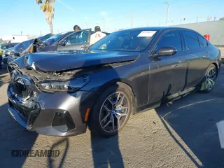 2024 BMW i5 eDrive40 with VIN WBY33FK09RCR42126, listed as a IAAI auction lot 41370577 with 9,601 mi miles and . Bid and sale history available at DreamBid. Image 2.