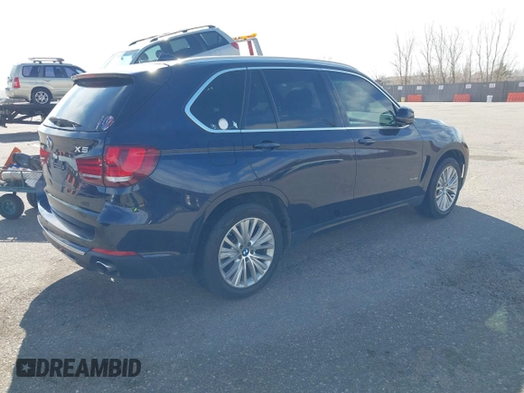 2016 BMW X5 xDrive35i with VIN 5UXKR0C54G0P19251, listed as a IAAI auction lot 41724798 with 87,824 mi miles. Bid and sale history available at carsss.com. Image 4.