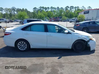 2015 Toyota Camry XLE with VIN 4T1BF1FK6FU948938, listed as a IAAI auction lot 42023487 with 107,232 mi miles. Bid and sale history available at carsss.com. Image 13.