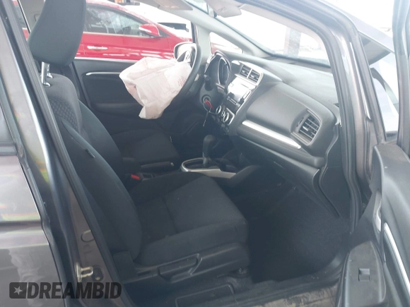 2020 Honda Fit LX with VIN 3HGGK5H42LM728368, listed as a IAAI auction lot 42271576 with 266,363 mi miles and . Bid and sale history available at DreamBid. Image 5.