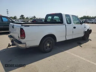 2004 Ford F-150 XL with VIN 2FTRX17W54CA63466, listed as a Copart auction lot 64022895 with 329,377 mi miles and Salvage title. Bid and sale history available at DreamBid. Image 3.