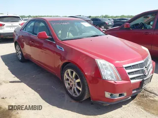 2008 Cadillac CTS RWD w/1SB with VIN 1G6DV57V980213836, listed as a IAAI auction lot 42006005 with 124,596 mi miles. Bid and sale history available at carsss.com. Image 1.