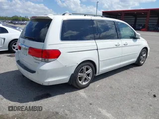 2008 Honda Odyssey Touring with VIN 5FNRL38858B006304, listed as a IAAI auction lot 41814309 with 208,778 mi miles. Bid and sale history available at carsss.com. Image 4.