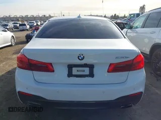 2019 BMW 5 Series 530e iPerformance with VIN WBAJA9C55KB254885, listed as a IAAI auction lot 41398164 with 62,781 mi miles. Bid and sale history available at carsss.com. Image 16.