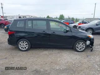 2015 Mazda 5 Sport with VIN JM1CW2BL2F0190990, listed as a IAAI auction lot 42532210 with 98,528 mi miles and . Bid and sale history available at DreamBid. Image 13.
