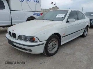 1997 BMW 5 Series 540i z VIN WBADE6327VBW50066, wystawiony jako IAAI lot #42149896 z przebiegiem 191 339 mil mil oraz . Historia ofert i sprzedaży dostępna na DreamBid. Obrazek 2.