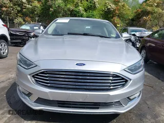 2017 Ford Fusion Titanium with VIN 3FA6P0K90HR266556, listed as a IAAI auction lot 41947924 with 135,628 mi miles. Bid and sale history available at carsss.com. Image 13.