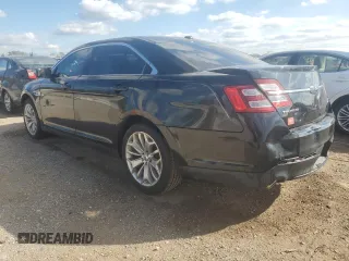 2013 Ford Taurus Limited with VIN 1FAHP2F89DG146004, listed as a Copart auction lot 73048674 with 163,650 mi miles and Salvage Title. Bid and sale history available at DreamBid. Image 2.