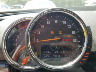 2016 MINI Clubman z VIN WMWLN5C5XG2E29275, wystawiony jako Copart lot #68162014 z przebiegiem 79 754 mil mil oraz Nie do naprawy. Historia ofert i sprzedaży dostępna na DreamBid. Obrazek 9.