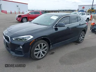 2020 BMW X2 xDrive28i with VIN WBXYJ1C02L5R71755, listed as a IAAI auction lot 41957012 with 69,997 mi miles. Bid and sale history available at carsss.com. Image 19.