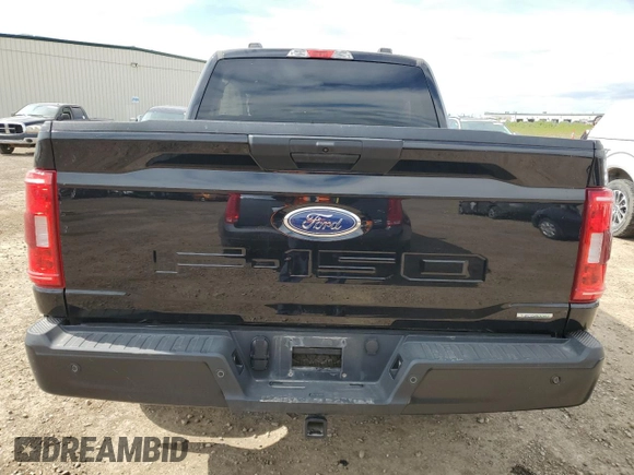 2023 Ford F-150 z VIN 1FTFW1P85PKF48519, wystawiony jako Copart lot #55944545 z przebiegiem 26 971 mil mil oraz Szkoda całkowita • Salvage title. Historia ofert i sprzedaży dostępna na DreamBid. Obrazek 6.