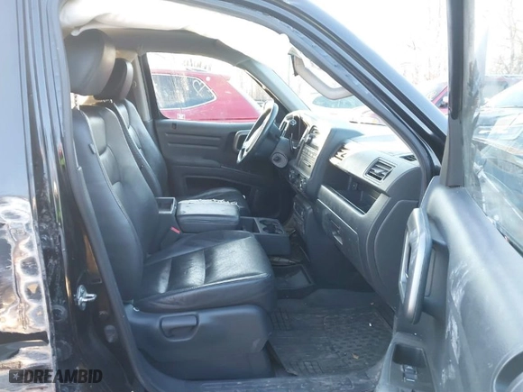 2009 Honda Ridgeline RTL with VIN 5FPYK16569B099998, listed as a IAAI auction lot 41403995 with 189,146 mi miles. Bid and sale history available at carsss.com. Image 5.