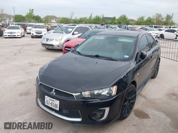 2016 Mitsubishi Lancer GT with VIN JA32U8FW8GU011501, listed as a IAAI auction lot 41779016 with 153,082 mi miles. Bid and sale history available at carsss.com. Image 2.