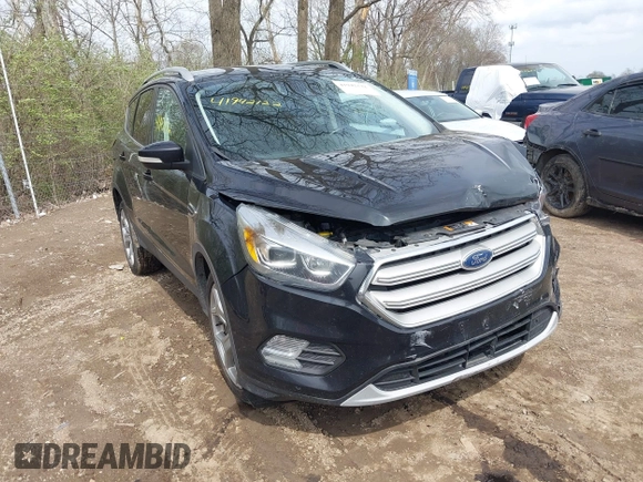2019 Ford Escape Titanium with VIN 1FMCU9J91KUC42161, listed as a IAAI auction lot 41942122 with 100,677 mi miles and . Bid and sale history available at DreamBid. Image 1.