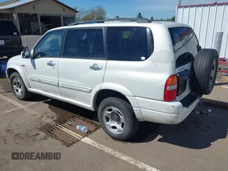 2002 Suzuki XL7 Standard z VIN JS3TX92V324125187, wystawiony jako IAAI lot #42195273 z przebiegiem 243 050 mil mil oraz . Historia ofert i sprzedaży dostępna na DreamBid. Obrazek 3.