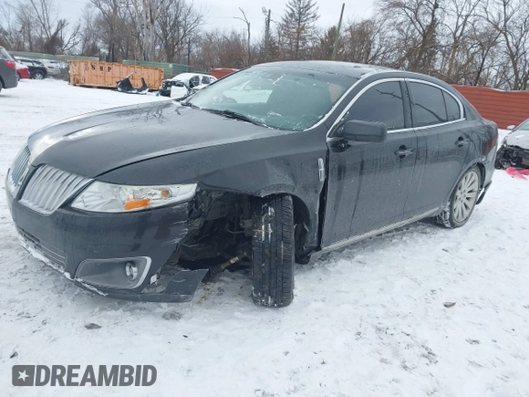 2012 Lincoln MKS with VIN 1LNHL9ER8CG806939, listed as a IAAI auction lot 41417607 with 147,808 mi miles. Bid and sale history available at carsss.com. Image 2.