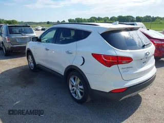 2013 Hyundai Santa Fe Sport z VIN 5XYZU3LA5DG045646, wystawiony jako IAAI lot #42380560 z przebiegiem 131 944 mil mil oraz . Historia ofert i sprzedaży dostępna na DreamBid. Obrazek 3.