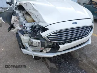 2018 Ford Fusion SE with VIN 3FA6P0HD7JR230705, listed as a IAAI auction lot 42518890 with 114,988 mi miles and . Bid and sale history available at DreamBid. Image 6.