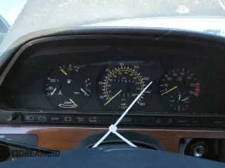 1986 Mercedes-Benz 420 with VIN WDBCA35DXGA210633, listed as a Copart auction lot 69728644 with 177,870 mi miles and Salvage Title. Bid and sale history available at carsss.com. Image 9.