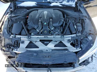 2016 BMW 7 Series 750i xDrive with VIN WBA7B0C50GG526899, listed as a Copart auction lot 46712485 with 97,985 mi miles and Salvage title. Bid and sale history available at DreamBid. Image 11.