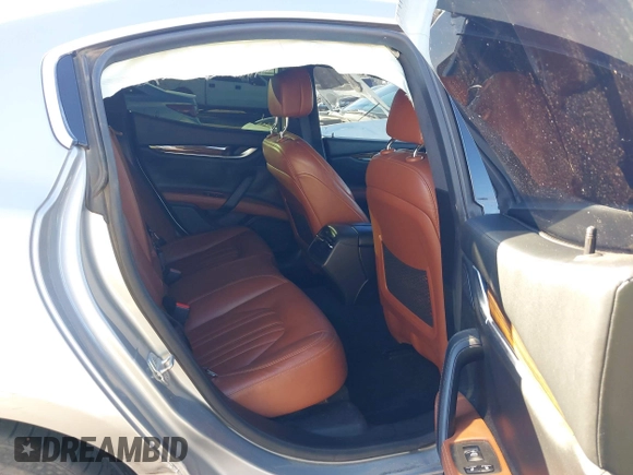 2015 Maserati Ghibli z VIN ZAM57XSA7F1135961, wystawiony jako IAAI lot #40831583 z przebiegiem 89 671 mil mil oraz . Historia ofert i sprzedaży dostępna na DreamBid. Obrazek 8.