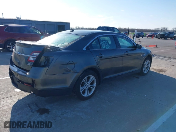 2016 Ford Taurus SEL with VIN 1FAHP2E88GG157761, listed as a IAAI auction lot 41937397 with 129,142 mi miles and . Bid and sale history available at DreamBid. Image 4.