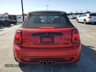 2019 MINI Convertible Cooper S z VIN WMWWG9C53K3E40071, wystawiony jako Copart lot #49553025 z przebiegiem 61 089 mil mil oraz Szkoda całkowita • Salvage title. Historia ofert i sprzedaży dostępna na DreamBid. Obrazek 6.