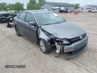 2011 Volkswagen Jetta SE z VIN 3VWDZ7AJ4BM370033, wystawiony jako IAAI lot #42367238 z przebiegiem 161 635 mil mil oraz . Historia ofert i sprzedaży dostępna na DreamBid. Obrazek 1.