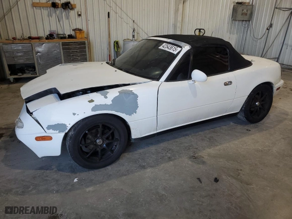 1992 Mazda MX-5 Miata with VIN JM1NA3514N0326347, listed as a Copart auction lot 42543615 with 123,295 mi miles and Salvage Title. Bid and sale history available at carsss.com. Image 1.