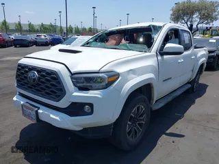 2022 Toyota Tacoma SR5 with VIN 3TMAZ5CN0NM161578, listed as a IAAI auction lot 42430201 with 39,654 mi miles and . Bid and sale history available at DreamBid. Image 2.