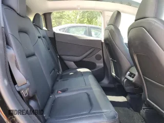 2024 Tesla Model Y z VIN 7SAYGDEDXRF991226, wystawiony jako Copart lot #62090255 z przebiegiem 42 853 mil mil oraz Szkoda całkowita • Salvage title. Historia ofert i sprzedaży dostępna na DreamBid. Obrazek 10.