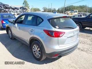 2016 Mazda CX-5 Sport with VIN JM3KE2BE9G0915168, listed as a IAAI auction lot 41482749 with 86,802 mi miles and . Bid and sale history available at carsss.com. Image 3.
