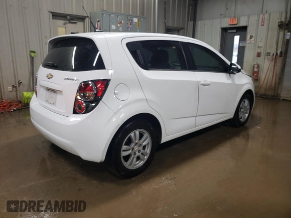 2014 Chevrolet Sonic LT with VIN 1G1JC6SH6E4239708, listed as a Copart auction lot 85530104 with 123,912 mi miles and Salvage Title. Bid and sale history available at carsss.com. Image 3.
